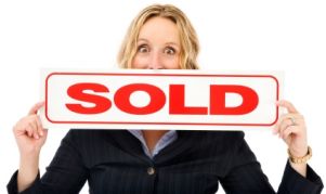 real estate sold sign