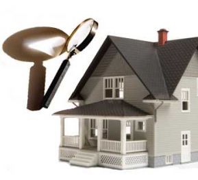 magnifying glass on house