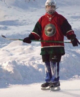 evergreen hockey player