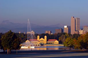 denver skyline from city park with mountain backdrop